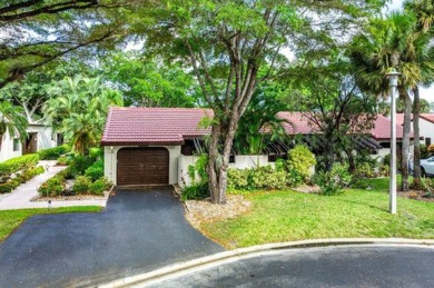 SPACIOUS WATERFRONT UNIT WITH NEW ROOF, GARAGE IN SOUGHT AFTER on Boca Lago Golf and Country Club in Florida - for sale on GolfHomes.com, golf home, golf lot