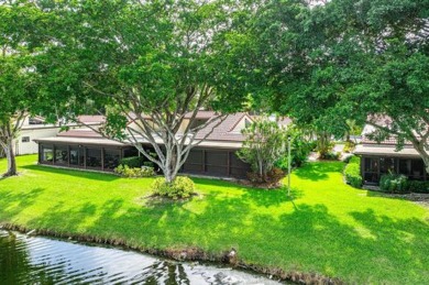 SPACIOUS WATERFRONT UNIT WITH NEW ROOF, GARAGE IN SOUGHT AFTER on Boca Lago Golf and Country Club in Florida - for sale on GolfHomes.com, golf home, golf lot