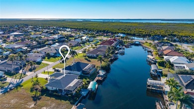 Prime Gulf-Access Living with Scenic Water Views & Exceptional on Royal Tee Country Club in Florida - for sale on GolfHomes.com, golf home, golf lot