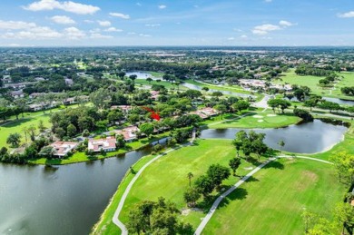 SPACIOUS WATERFRONT UNIT WITH NEW ROOF, GARAGE IN SOUGHT AFTER on Boca Lago Golf and Country Club in Florida - for sale on GolfHomes.com, golf home, golf lot