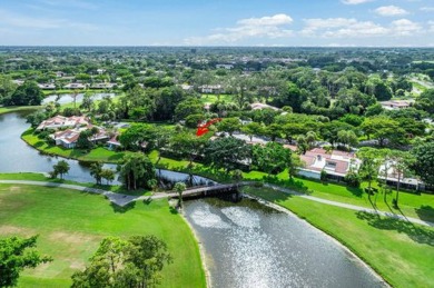 SPACIOUS WATERFRONT UNIT WITH NEW ROOF, GARAGE IN SOUGHT AFTER on Boca Lago Golf and Country Club in Florida - for sale on GolfHomes.com, golf home, golf lot