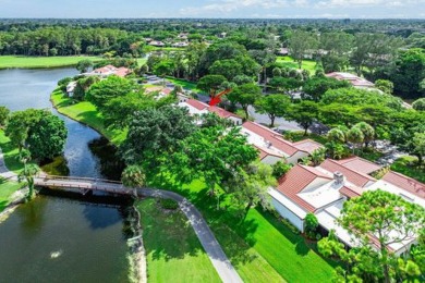 SPACIOUS WATERFRONT UNIT WITH NEW ROOF, GARAGE IN SOUGHT AFTER on Boca Lago Golf and Country Club in Florida - for sale on GolfHomes.com, golf home, golf lot