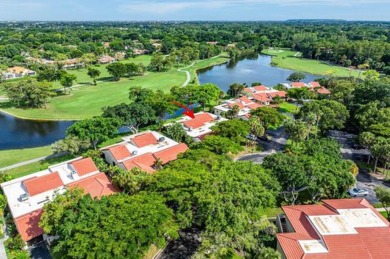 SPACIOUS WATERFRONT UNIT WITH NEW ROOF, GARAGE IN SOUGHT AFTER on Boca Lago Golf and Country Club in Florida - for sale on GolfHomes.com, golf home, golf lot