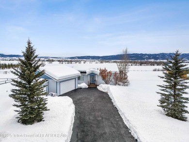 This one-owner residence sits on an oversized 1.12 acre on Star Valley RV Golf Course in Wyoming - for sale on GolfHomes.com, golf home, golf lot