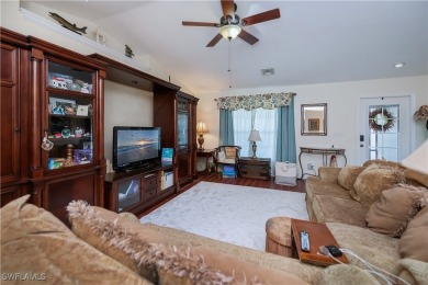 Welcome to this fabulous salt water pool home with a tranquil on Burnt Store Golf Club in Florida - for sale on GolfHomes.com, golf home, golf lot