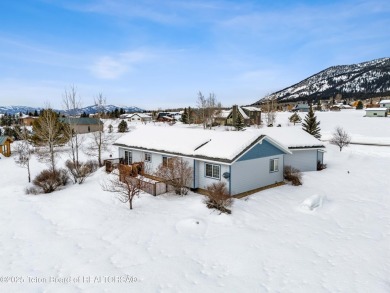 This one-owner residence sits on an oversized 1.12 acre on Star Valley RV Golf Course in Wyoming - for sale on GolfHomes.com, golf home, golf lot