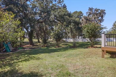 Stunning golf course home overlooking the 5th green of on Southwood Golf Club in Florida - for sale on GolfHomes.com, golf home, golf lot