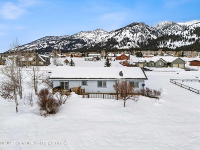 This one-owner residence sits on an oversized 1.12 acre on Star Valley RV Golf Course in Wyoming - for sale on GolfHomes.com, golf home, golf lot