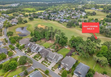 Stunning golf course home overlooking the 5th green of on Southwood Golf Club in Florida - for sale on GolfHomes.com, golf home, golf lot