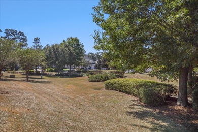 Stunning golf course home overlooking the 5th green of on Southwood Golf Club in Florida - for sale on GolfHomes.com, golf home, golf lot