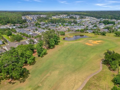 Stunning golf course home overlooking the 5th green of on Southwood Golf Club in Florida - for sale on GolfHomes.com, golf home, golf lot