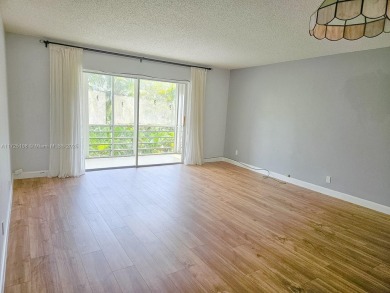 Step into modern comfort at 1000 NE 14th Ave #404! This on The Diplomat Golf Resort and Spa in Florida - for sale on GolfHomes.com, golf home, golf lot