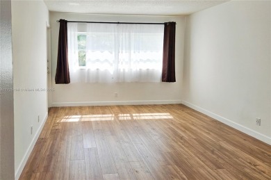 Step into modern comfort at 1000 NE 14th Ave #404! This on The Diplomat Golf Resort and Spa in Florida - for sale on GolfHomes.com, golf home, golf lot