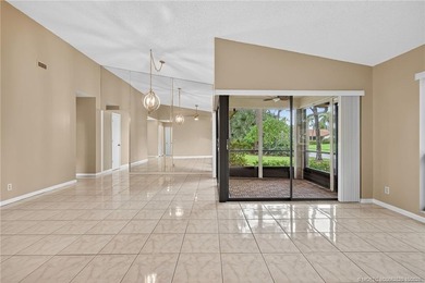 Welcome home to this beautifully updated single-story residence on Martin Downs Country Club in Florida - for sale on GolfHomes.com, golf home, golf lot