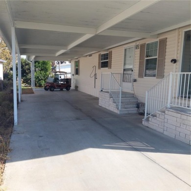 lovely 2bedroom/2bath mobile home located in the Family Nudist on Heritage Harbor Golf and Country Club in Florida - for sale on GolfHomes.com, golf home, golf lot