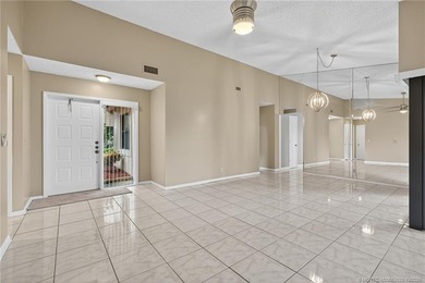Welcome home to this beautifully updated single-story residence on Martin Downs Country Club in Florida - for sale on GolfHomes.com, golf home, golf lot