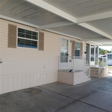 lovely 2bedroom/2bath mobile home located in the Family Nudist on Heritage Harbor Golf and Country Club in Florida - for sale on GolfHomes.com, golf home, golf lot