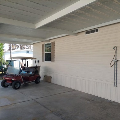 lovely 2bedroom/2bath mobile home located in the Family Nudist on Heritage Harbor Golf and Country Club in Florida - for sale on GolfHomes.com, golf home, golf lot