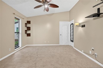 Welcome home to this beautifully updated single-story residence on Martin Downs Country Club in Florida - for sale on GolfHomes.com, golf home, golf lot