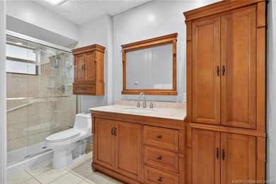 Welcome home to this beautifully updated single-story residence on Martin Downs Country Club in Florida - for sale on GolfHomes.com, golf home, golf lot