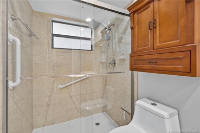 Welcome home to this beautifully updated single-story residence on Martin Downs Country Club in Florida - for sale on GolfHomes.com, golf home, golf lot