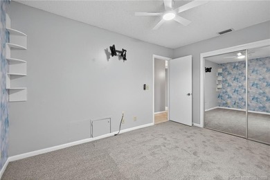 Welcome home to this beautifully updated single-story residence on Martin Downs Country Club in Florida - for sale on GolfHomes.com, golf home, golf lot