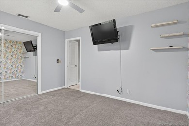 Welcome home to this beautifully updated single-story residence on Martin Downs Country Club in Florida - for sale on GolfHomes.com, golf home, golf lot