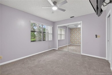 Welcome home to this beautifully updated single-story residence on Martin Downs Country Club in Florida - for sale on GolfHomes.com, golf home, golf lot