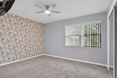 Welcome home to this beautifully updated single-story residence on Martin Downs Country Club in Florida - for sale on GolfHomes.com, golf home, golf lot