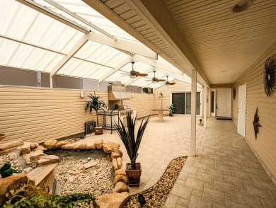 The perfect home for the RV community or convert the RV garage on The Great Outdoors Golf and Country Club in Florida - for sale on GolfHomes.com, golf home, golf lot
