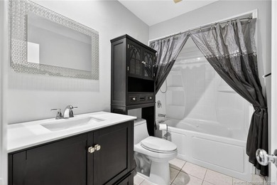 Welcome home to this beautifully updated single-story residence on Martin Downs Country Club in Florida - for sale on GolfHomes.com, golf home, golf lot