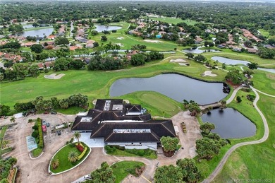 Welcome home to this beautifully updated single-story residence on Martin Downs Country Club in Florida - for sale on GolfHomes.com, golf home, golf lot