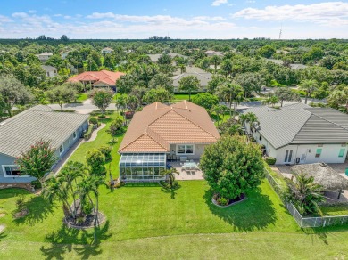 Set on the 1st fairway of Hammock Creek's Jack Nicklaus course on Hammock Creek Golf Club in Florida - for sale on GolfHomes.com, golf home, golf lot