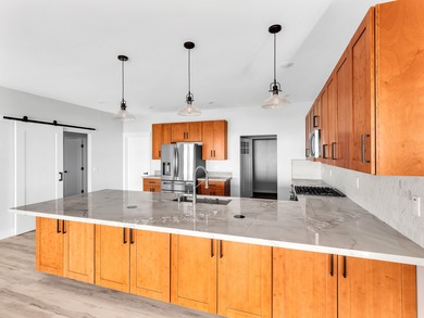 Enjoy expansive coastline and ocean views the moment you enter on Discovery Harbour Golf Course in Hawaii - for sale on GolfHomes.com, golf home, golf lot