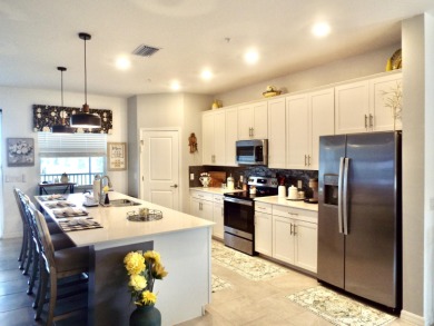 Here Is A Chance To Own The Very Sought After Top Floor Coach on Panther Run Golf Club in Florida - for sale on GolfHomes.com, golf home, golf lot