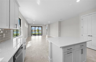 Enjoy low-maintenance, resort-style living in this beautifully on River Hall Country Club in Florida - for sale on GolfHomes.com, golf home, golf lot