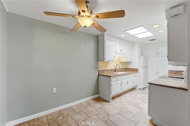 This light-filled Monterey model condo in Laguna Woods offers a on Leisure Village Par 3 Golf Course in California - for sale on GolfHomes.com, golf home, golf lot