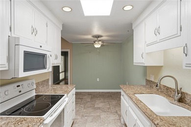 This light-filled Monterey model condo in Laguna Woods offers a on Leisure Village Par 3 Golf Course in California - for sale on GolfHomes.com, golf home, golf lot