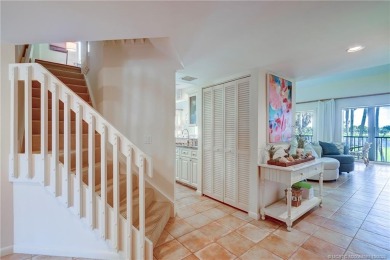 Enjoy breathtaking panoramic views of the golf course and lake on Ocean Club At the Hutchinson Island Beach Resort in Florida - for sale on GolfHomes.com, golf home, golf lot