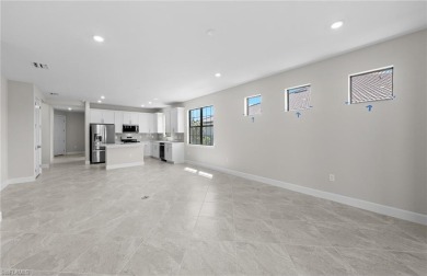 Enjoy low-maintenance, resort-style living in this beautifully on River Hall Country Club in Florida - for sale on GolfHomes.com, golf home, golf lot
