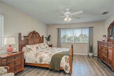 This beautifully maintained two-story home is located in the on Valencia Golf and Country Club in Florida - for sale on GolfHomes.com, golf home, golf lot