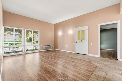 This light-filled Monterey model condo in Laguna Woods offers a on Leisure Village Par 3 Golf Course in California - for sale on GolfHomes.com, golf home, golf lot