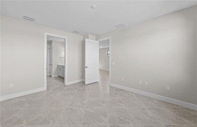Enjoy low-maintenance, resort-style living in this beautifully on River Hall Country Club in Florida - for sale on GolfHomes.com, golf home, golf lot
