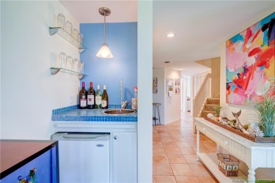 Enjoy breathtaking panoramic views of the golf course and lake on Ocean Club At the Hutchinson Island Beach Resort in Florida - for sale on GolfHomes.com, golf home, golf lot