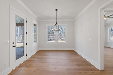 Timeless design, modern comfort, and the privacy of an oversized on Harbor Club Golf and Country Club in Georgia - for sale on GolfHomes.com, golf home, golf lot