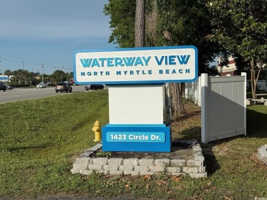 This cozy 2 bed, 1 bath furnished mobile home in the Waterway on Barefoot Resort and Golf Club  in South Carolina - for sale on GolfHomes.com, golf home, golf lot