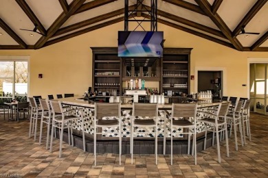 Enjoy low-maintenance, resort-style living in this beautifully on River Hall Country Club in Florida - for sale on GolfHomes.com, golf home, golf lot