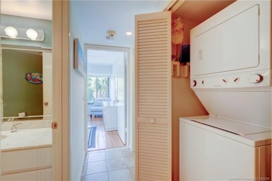 Enjoy breathtaking panoramic views of the golf course and lake on Ocean Club At the Hutchinson Island Beach Resort in Florida - for sale on GolfHomes.com, golf home, golf lot