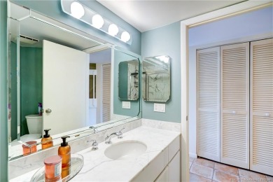 Enjoy breathtaking panoramic views of the golf course and lake on Ocean Club At the Hutchinson Island Beach Resort in Florida - for sale on GolfHomes.com, golf home, golf lot