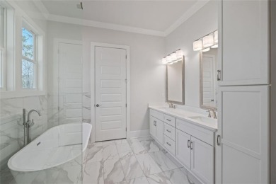 Timeless design, modern comfort, and the privacy of an oversized on Harbor Club Golf and Country Club in Georgia - for sale on GolfHomes.com, golf home, golf lot